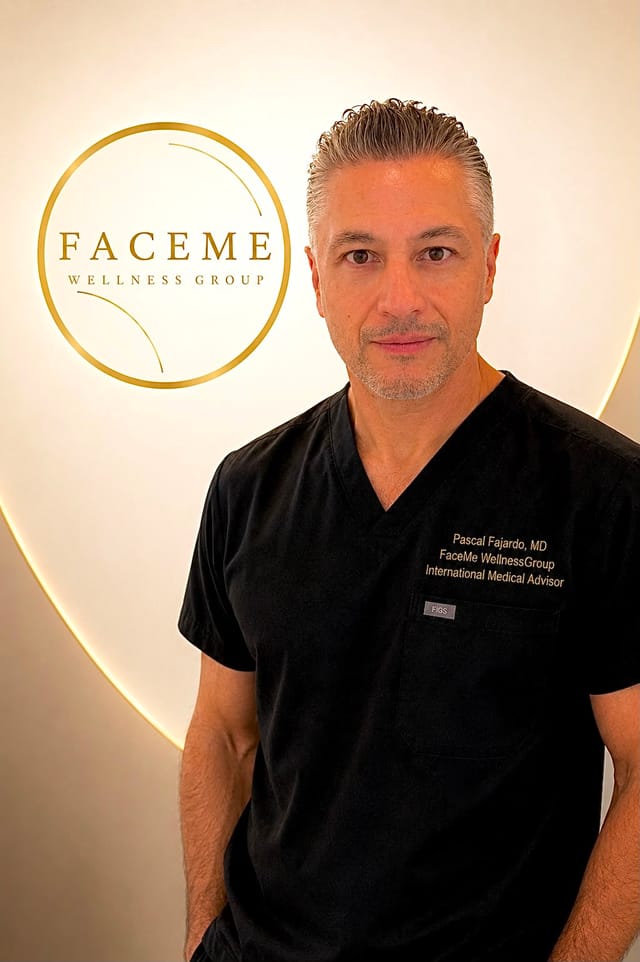 Pascal Fajardo, MD, in front of the FaceMe Wellness Group mark